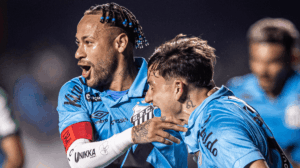 Neymar comemora gol com camisa azul do Santos