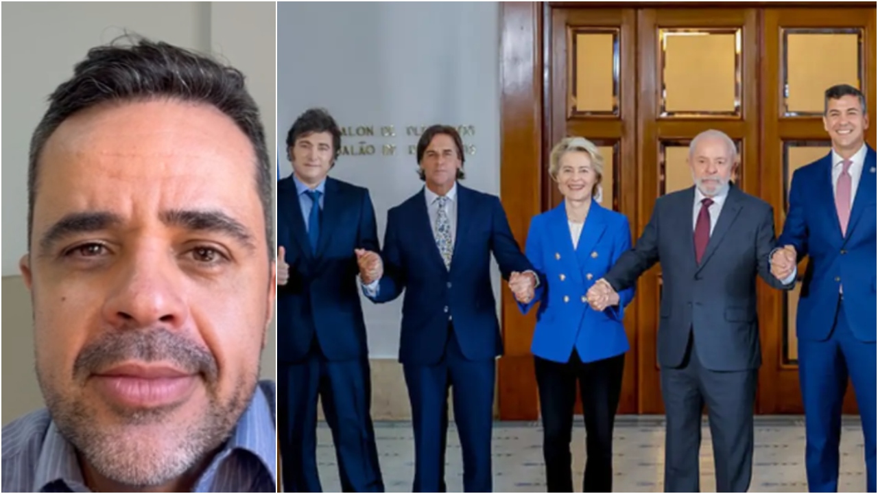 O professor Wilson Mendonça ao lado de uma montagem com os líderes da UE e Mercosul