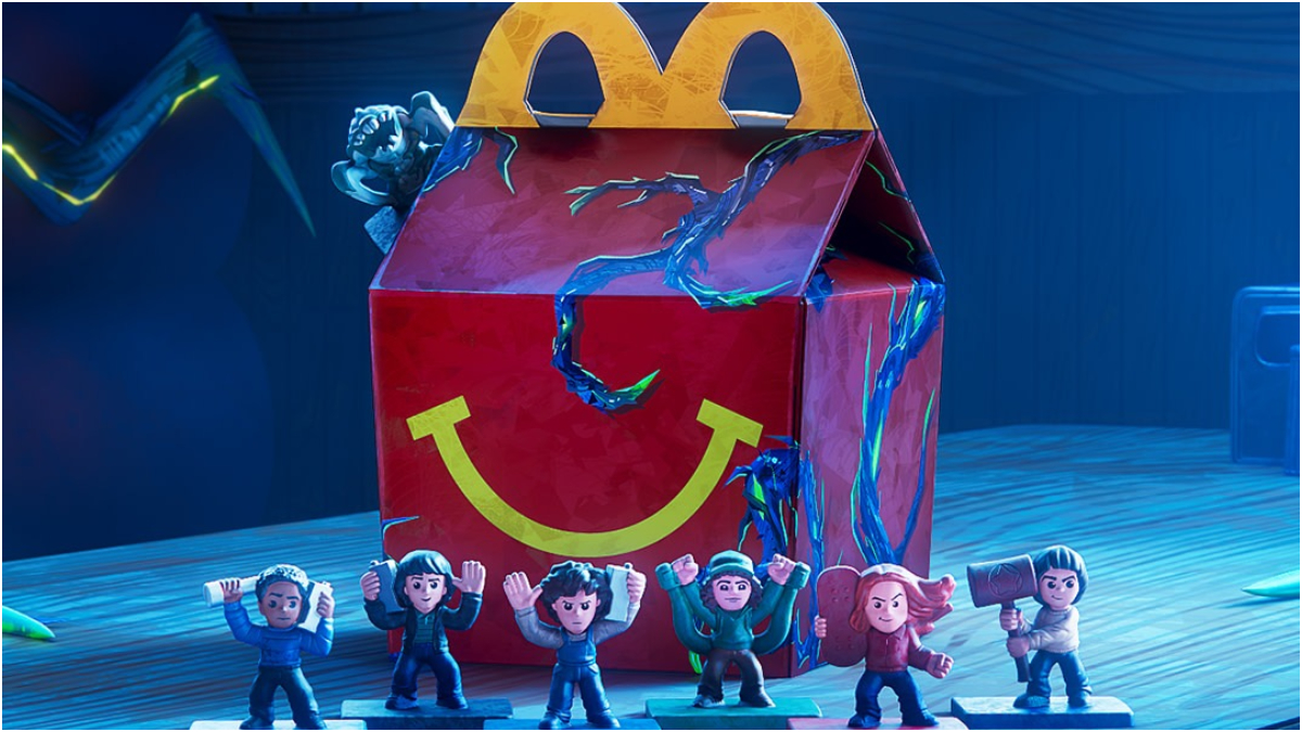 foto mostra personagens de stranger things perto da caixa de McLance Feliz